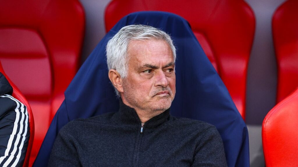 Jose Mourinho looking thoughtful on the touchline during a football match
