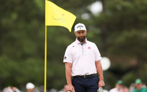 Nick Faldo and Jon Rahm looking on during a professional golf tournament