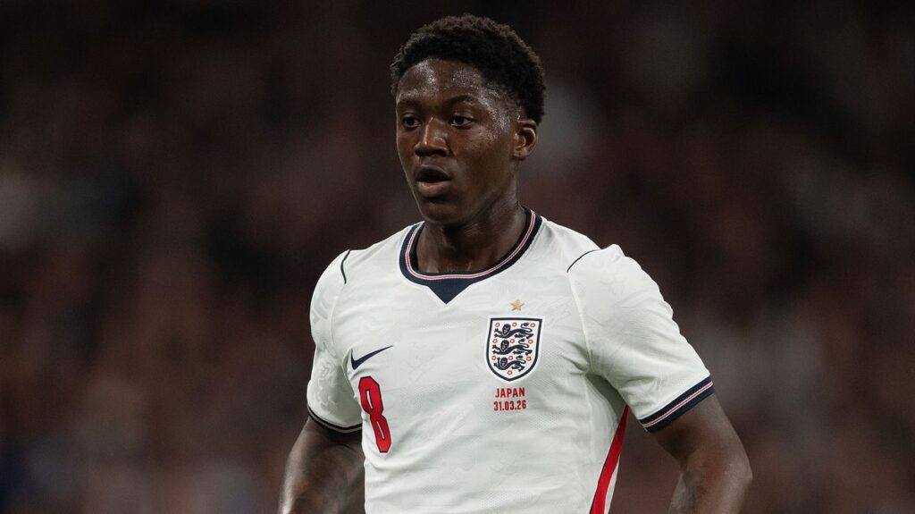 Close-up of the new Nike England World Cup football shirt highlighting the shoulder stitching