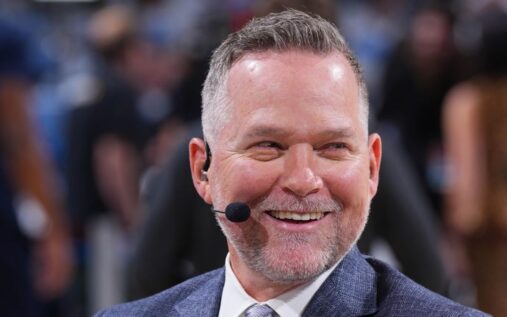 Michael Malone directing players from the sidelines during a basketball game