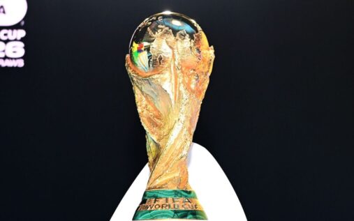 Thomas Tuchel and Steve Clarke standing on the touchline during an international football match