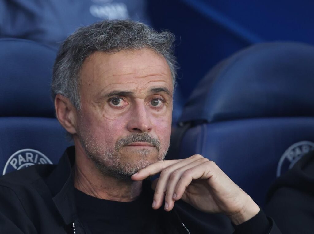 Achraf Hakimi receiving medical treatment on the pitch during Paris Saint-Germain's match against Bayern Munich