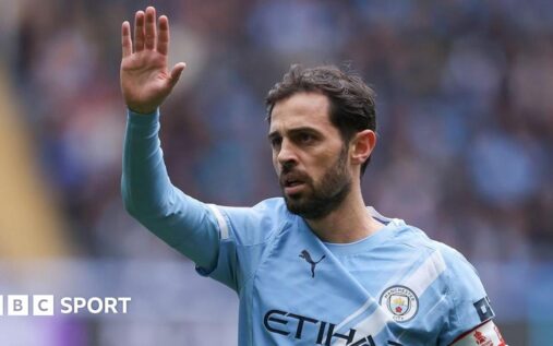 Manchester City manager Pep Guardiola giving instructions to captain Bernardo Silva during a match