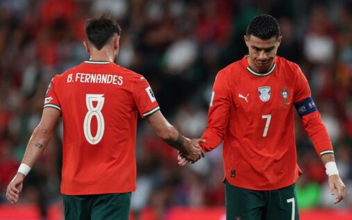 Cristiano Ronaldo looking thoughtful while wearing the Portugal national team kit