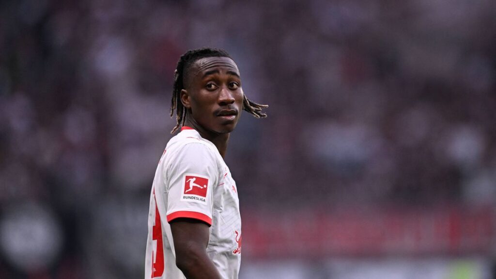 RB Leipzig forward Yan Diomande running with the ball during a German Bundesliga match.