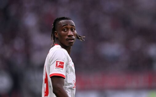 RB Leipzig forward Yan Diomande running with the ball during a German Bundesliga match.