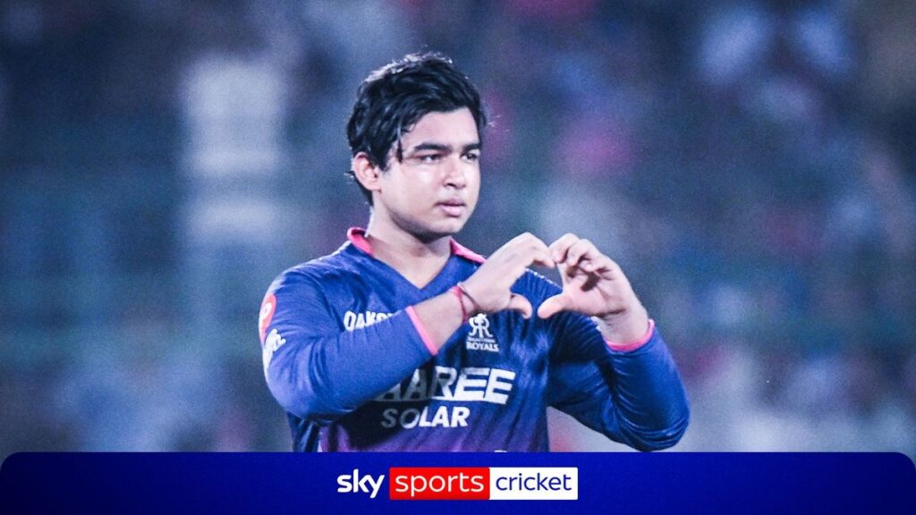 Fifteen-year-old Vaibhav Sooryavanshi raising his bat to celebrate an IPL century for the Rajasthan Royals