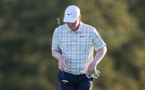 Robert MacIntyre looking frustrated on the golf course during the opening round of the Masters at Augusta National