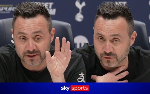 Roberto De Zerbi speaking into a microphone during his first press conference as Tottenham Hotspur head coach