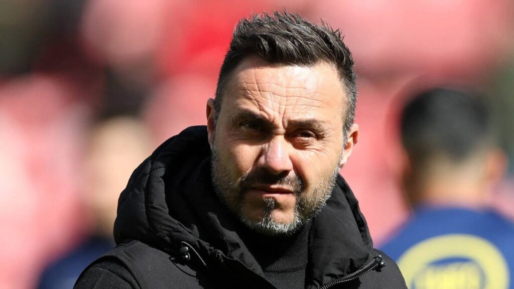 Tottenham manager Roberto De Zerbi looking thoughtful on the touchline during a Premier League match