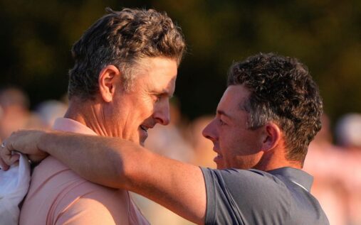 Rory McIlroy wearing the green jacket and smiling after winning back-to-back Masters titles at Augusta National
