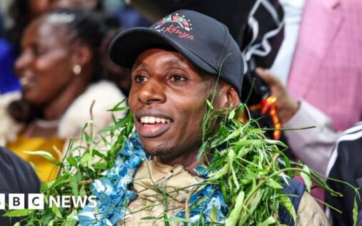 Sabastian Sawe celebrating with officials and supporters at Nairobi airport