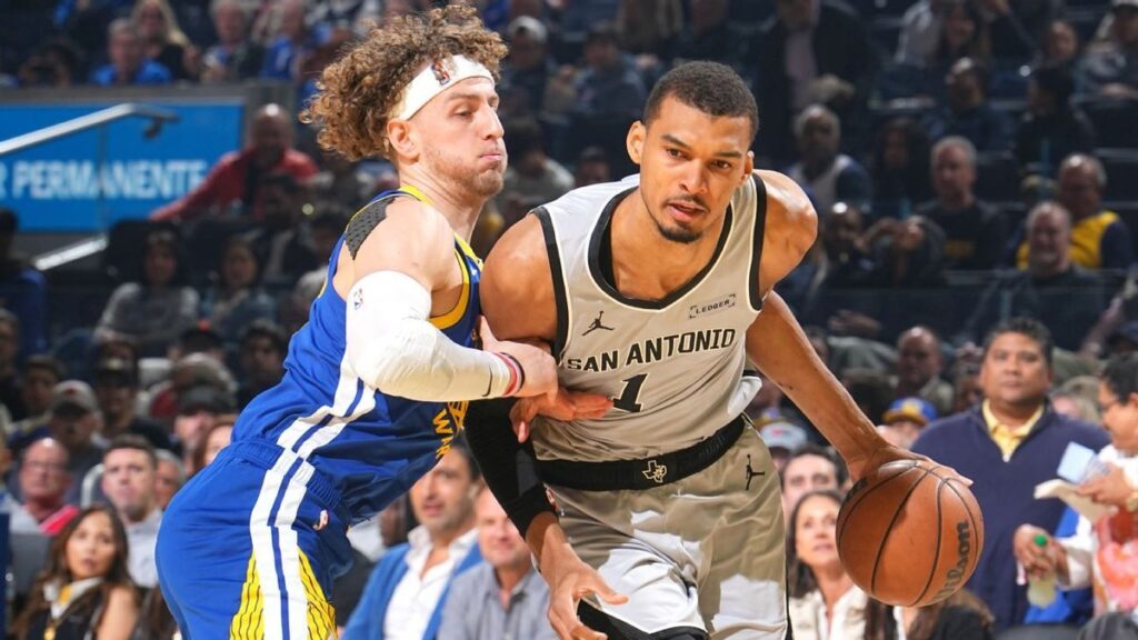 San Antonio Spurs centre Victor Wembanyama dunking a basketball during an NBA match
