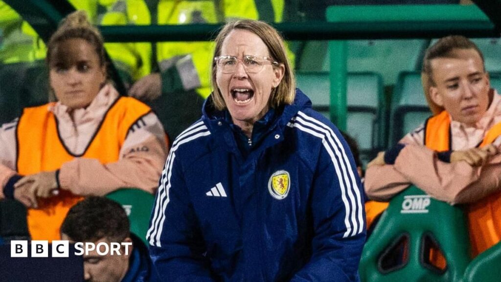 Scotland women's head coach Melissa Andreatta standing on the touchline observing a match