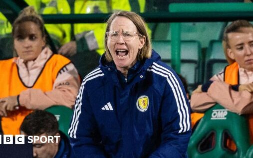 Scotland women's head coach Melissa Andreatta standing on the touchline observing a match