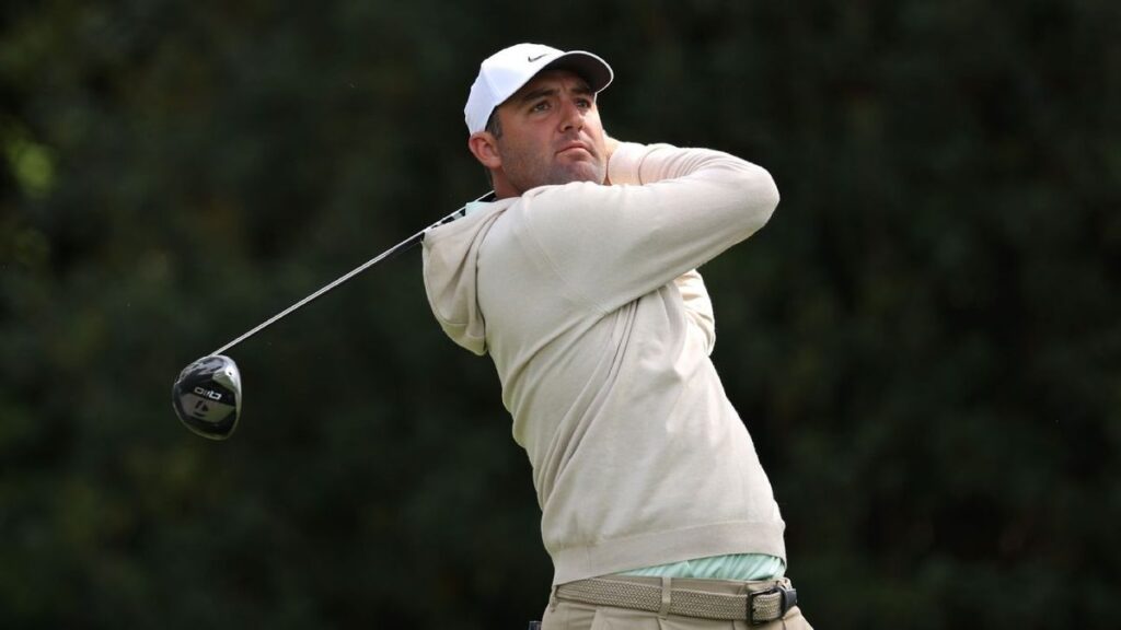 Scottie Scheffler playing a shot on the fairway at Augusta National Golf Club during the Masters tournament