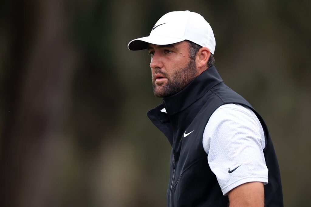 Scottie Scheffler playing a shot on the golf course ahead of The Masters at Augusta National