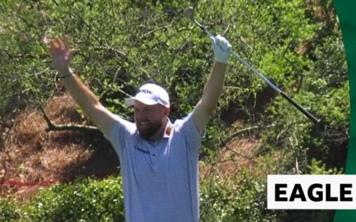 Shane Lowry watching his approach shot soar towards the green at Augusta National