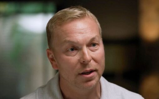 Sir Chris Hoy speaking at a microphone during a public event to raise awareness for prostate cancer screening
