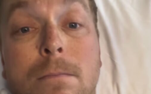 Sir Chris Hoy riding a mountain bike on a wooded trail