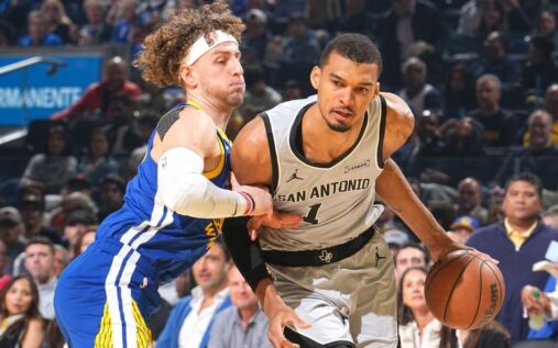 San Antonio Spurs forward Victor Wembanyama reacts on the court during an NBA game