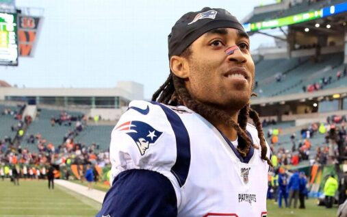 Stephon Gilmore looking on while playing for the New England Patriots