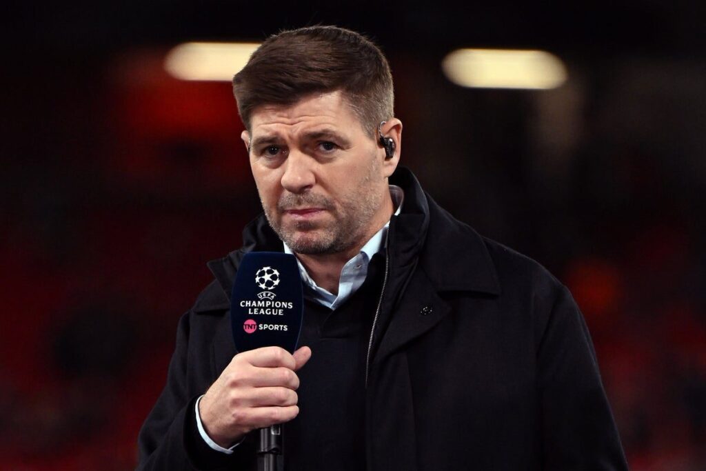 Steven Gerrard working as a television pundit during a Champions League broadcast