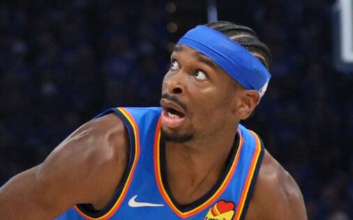 Shai Gilgeous-Alexander of the Oklahoma City Thunder driving to the basket during an NBA playoff game