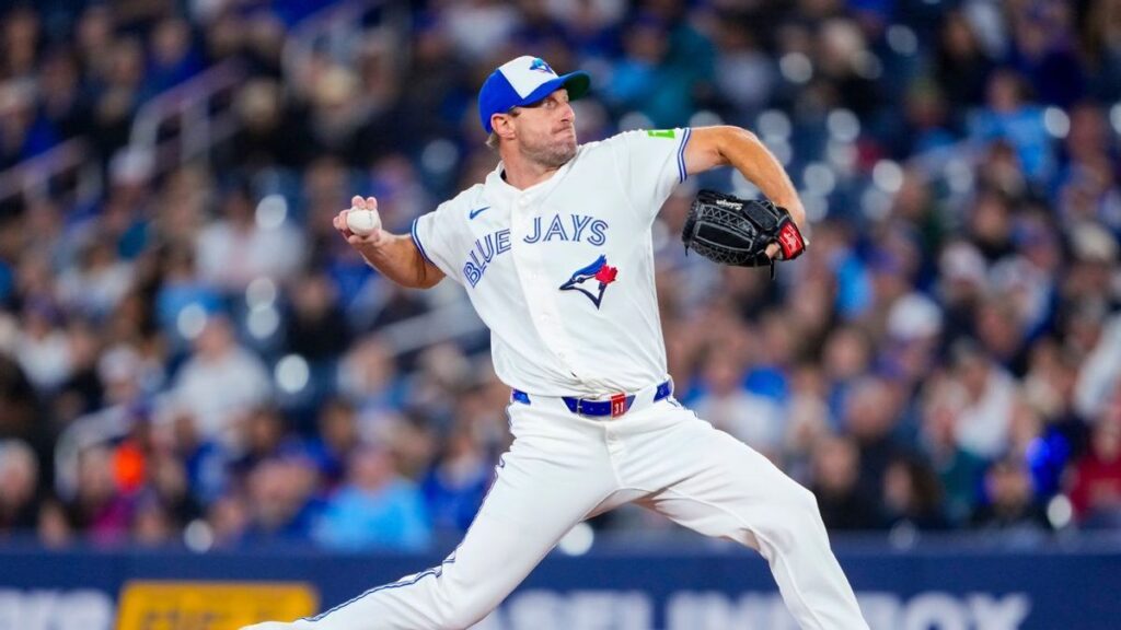 Toronto Blue Jays pitcher Max Scherzer throwing a pitch from the mound