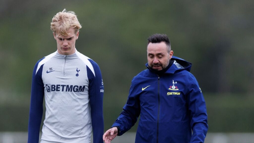 Roberto De Zerbi directing players from the touchline during a match