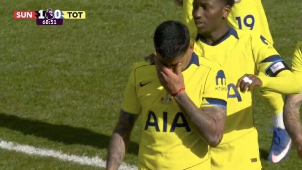 Cristian Romero receiving medical treatment on the pitch during Tottenham's match at Sunderland