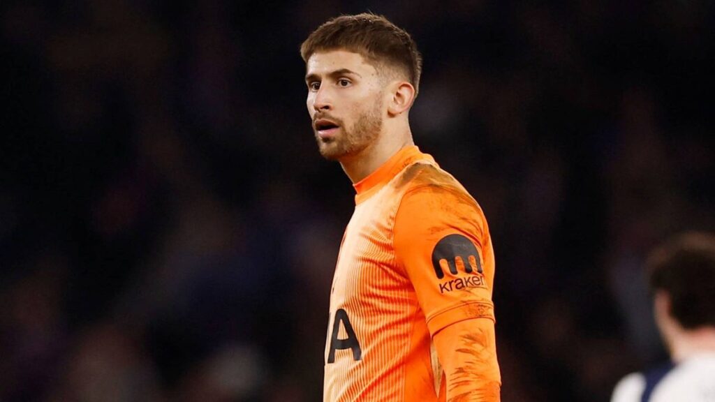 Tottenham Hotspur defenders Radu Dragusin and Cristian Romero on the pitch