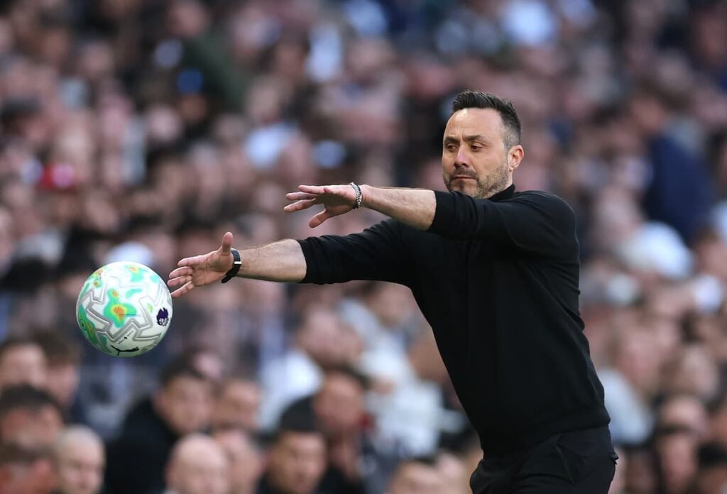 Tottenham Hotspur manager Roberto De Zerbi looking serious on the touchline during a Premier League match