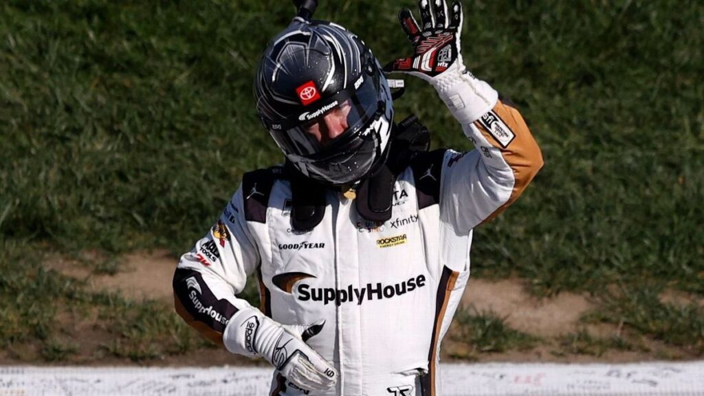 Tyler Reddick celebrating his dramatic NASCAR Cup Series victory in the No. 45 Toyota at Kansas Speedway