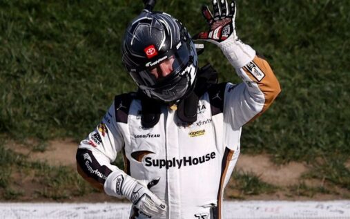 Tyler Reddick celebrating his dramatic NASCAR Cup Series victory in the No. 45 Toyota at Kansas Speedway