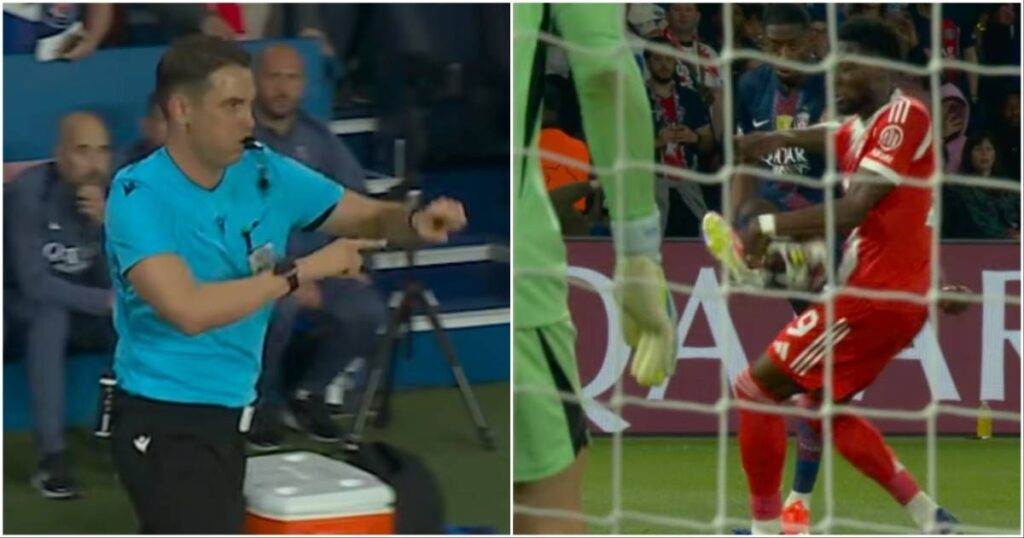 A football referee pointing to the penalty spot during a Champions League match