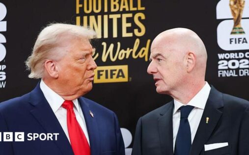 Football fans gathered outside a major stadium under heavy security presence during an international tournament match