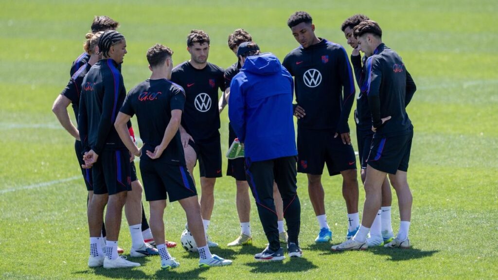 A drone hovering above a football pitch recording a USMNT training session