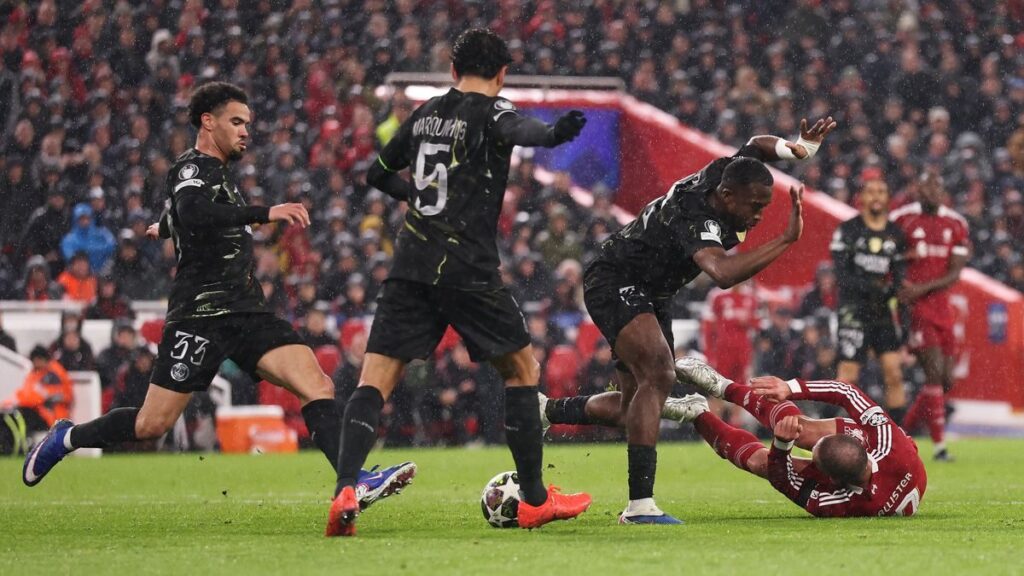 Alexis Mac Allister reacting to the overturned penalty decision during Liverpool's match against Paris Saint-Germain