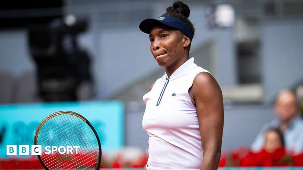 Venus Williams looking dejected on the tennis court during her straight-sets defeat at the Madrid Open