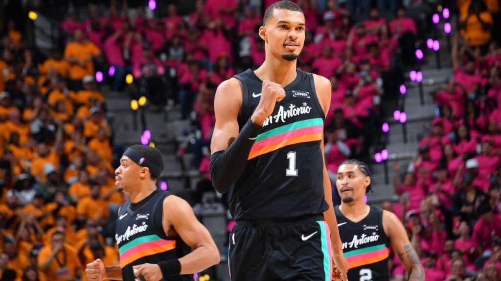 Victor Wembanyama handles the basketball for the San Antonio Spurs during his NBA playoff debut