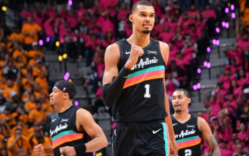 Victor Wembanyama handles the basketball for the San Antonio Spurs during his NBA playoff debut