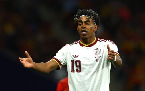 Real Madrid forward Vinicius Jr and Barcelona winger Lamine Yamal on the pitch