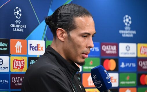Liverpool captain Virgil van Dijk pointing and shouting instructions to his teammates on the pitch