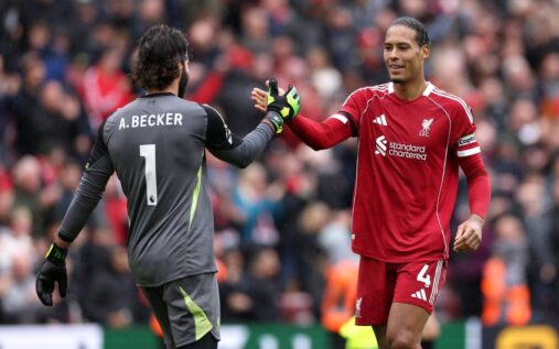 Virgil van Dijk and Alisson Becker talking during a Liverpool Premier League match