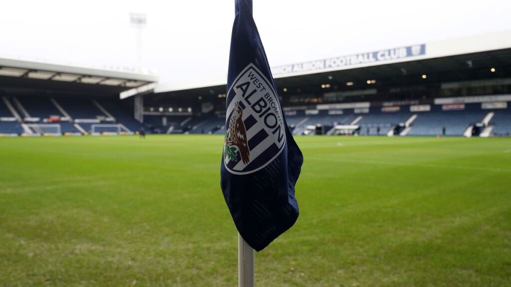 West Bromwich Albion players looking dejected on the pitch during a Championship match