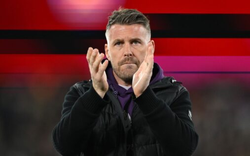 Dejected Wolverhampton Wanderers players reacting on the pitch