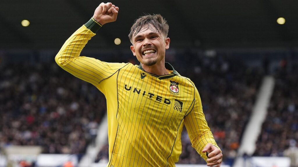 Wrexham players celebrating their second-half equaliser against West Bromwich Albion at The Hawthorns
