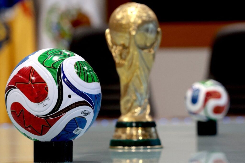The official Trionda match ball for the 2026 World Cup featuring red, blue and green graphics