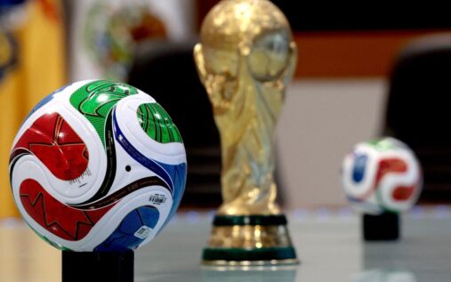 The official Trionda match ball for the 2026 World Cup featuring red, blue and green graphics